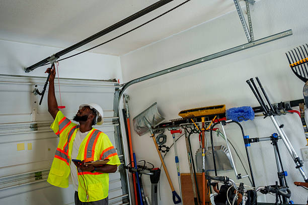 Professional Garage Door Roller Replacement technician working in Laurinburg, NC